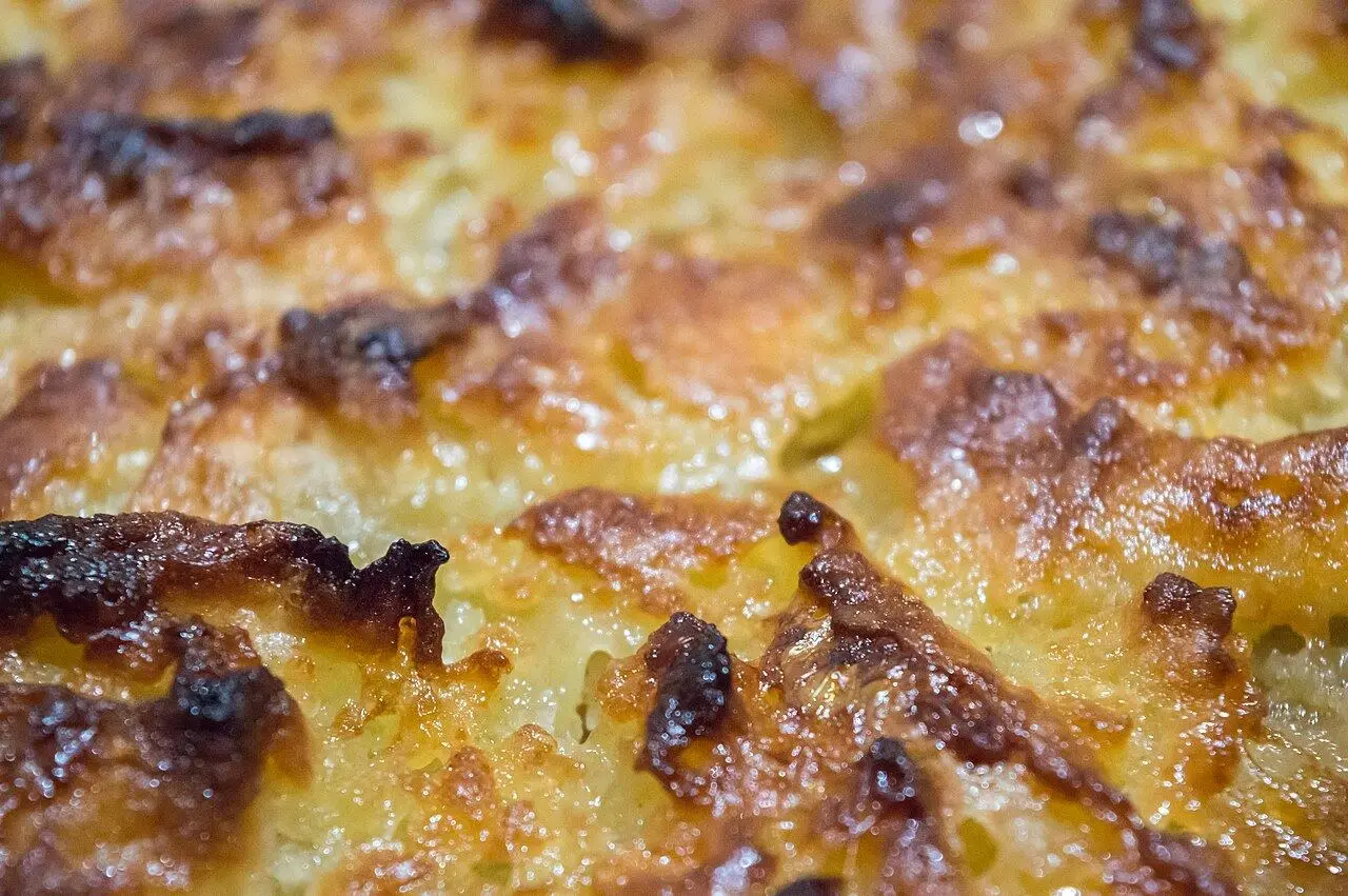 Close-up of a kouign amann’s caramelised, blistered crust